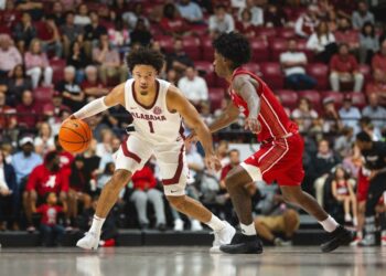 Nov 8, 2024; Tuscaloosa, Alabama, USA; Alabama Crimson Tide guard Mark Sears (1) drives the ball against Arkansas State Red Wolves guard Terrance Ford Jr. (11) during the second half at Coleman Coliseum. Mandatory Credit: Will McLelland-Imagn Images