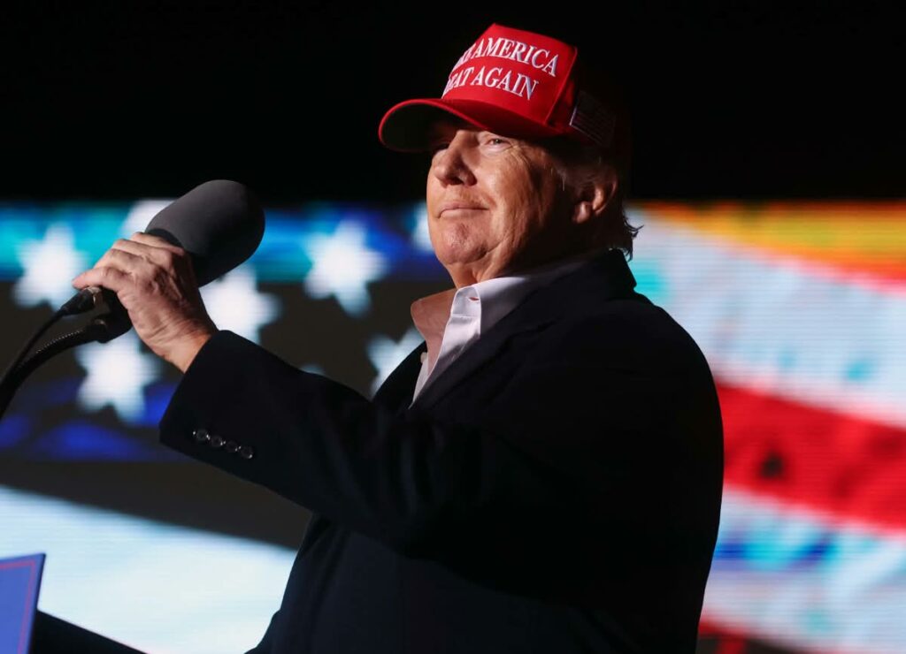 FLORENCE, ARIZONA - JANUARY 15: Former President Donald Trump prepares to speak at a rally at the Ca