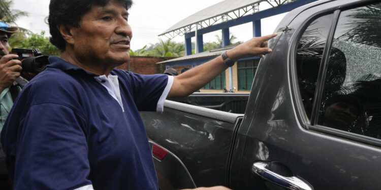 Bolivia's Evo Morales tells AP he'll press on with a hunger strike until his rival accepts dialogue