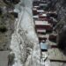 Bolivia’s heavy rain causes river to flood homes near La Paz