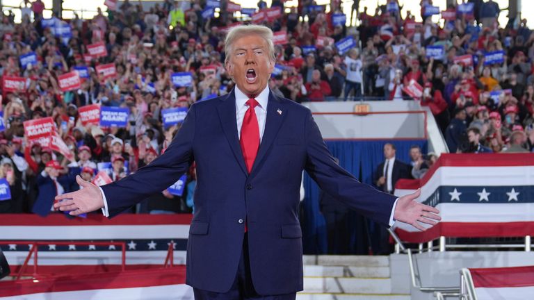 Donald Trump arrives to speak during a campaign rally in Raleigh.
Pic: AP