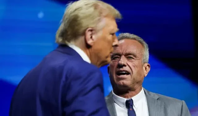 Robert F Kennedy Jr and Republican presidential nominee and former U.S. President Donald Trump attend a campaign event sponsored by conservative group Turning Point USA, in Duluth, Georgia, U.S., October 23, 2024.