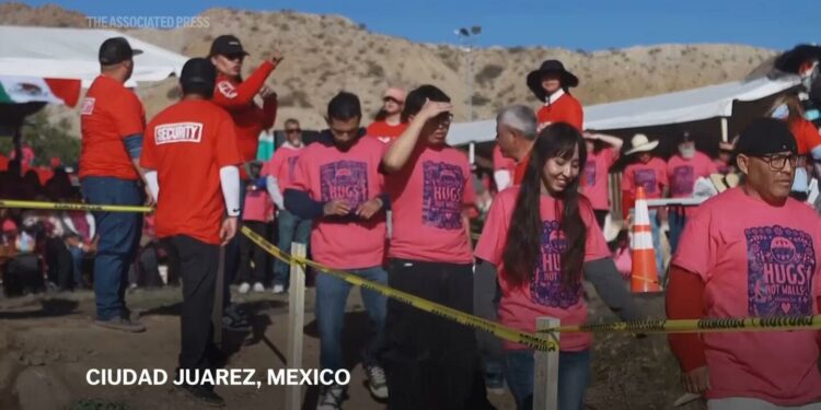 Families living both sides of U.S.-Mexico border embrace in emotional reunion