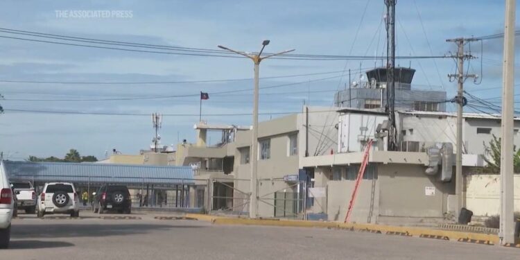 Haiti's main airport and capital frozen a day after a plane was shot by gangs