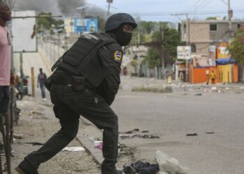 Haiti's main airport and capital frozen after a day of violence