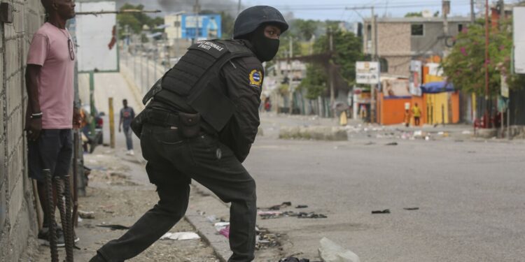 Haiti's main airport and capital frozen after a day of violence