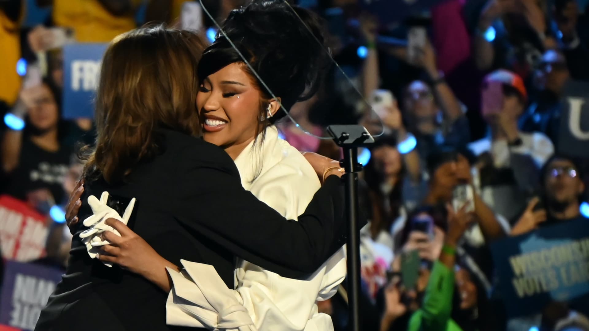 Vice President Kamala Harris and Cardi B embrace on stage at a campaign rally four days before Election Day at Wisconsin State Fair Park Exposition Center in West Allis, Wisconsin, Nov. 1, 2024.