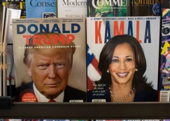 Tigard, OR, USA - Sep 5, 2024: Magazines published by A360 Media with presidential nominees Donald J. Trump and Kamala Harris on the covers are displayed at a bookstore in Tigard, Oregon.