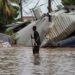 A resident examines storm damage caused by Hurricane Eta in Planeta, Honduras, on Nov. 6, 2020.