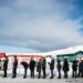 Reuters Voters stand in line waiting to cast their votes during the parliamentary election, outside the Inussivik arena, in Nuuk, Greenland