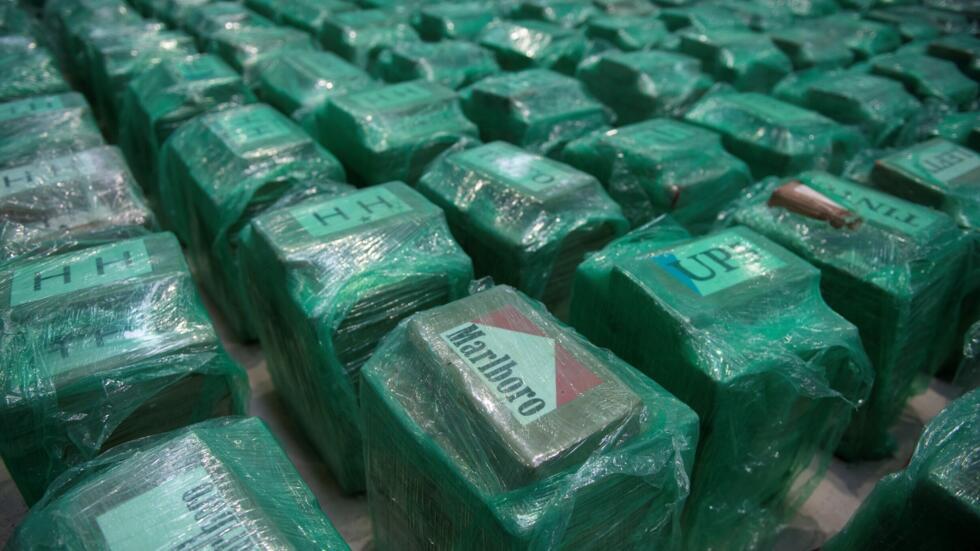 A picture taken on November 6, 2024 shows packages of cocaine that were found in a container from Ecuador