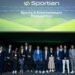 A group of people stands on stage under a large presentation screen displaying the ‘Sportian’ logo and the phrase ‘Sports & Entertainment Reinvention’