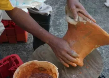 BBC A traditional coal pot being made by hand