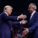 Donald Trump greeting Robert F. Kennedy Jr. on stage during a campaign event at Desert Diamond Arena in Glendale, Arizona, on August 23, 2024.