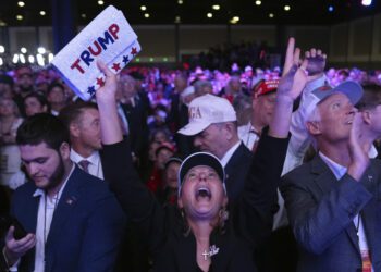 Supporters watch returns at a campaign election night watch party for Republican presidential nomin...