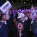 Supporters watch returns at a campaign election night watch party for Republican presidential nomin...
