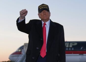 Republican presidential nominee former President Donald Trump gestures at a campaign rally at Kinston Regional Jetport, Sunday, Nov. 3, 2024, in Kinston, N.C. (AP Photo/Evan Vucci)