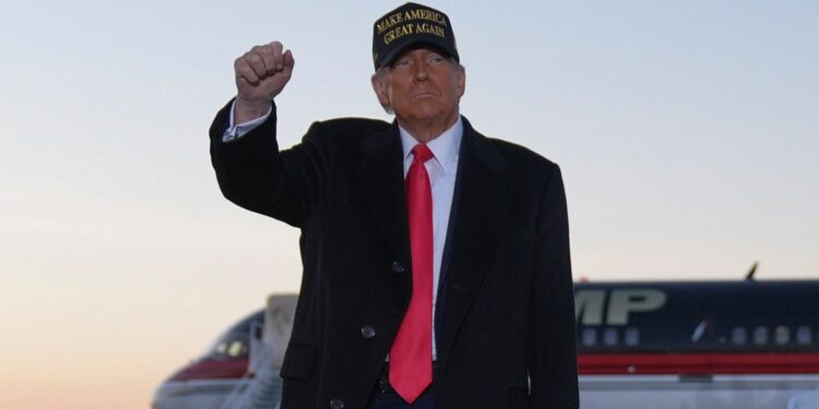 Republican presidential nominee former President Donald Trump gestures at a campaign rally at Kinston Regional Jetport, Sunday, Nov. 3, 2024, in Kinston, N.C. (AP Photo/Evan Vucci)