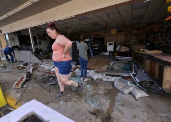 US employers added just 12,000 jobs last month as hurricanes and strikes sharply reduce payrolls