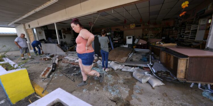 US employers added just 12,000 jobs last month as hurricanes and strikes sharply reduce payrolls