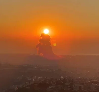 Smoke rises above buildings in Beirut, as seen from Beit Mery, Lebanon Friday, in this still image obtained from social media video.  CIELA.TRAVELS VIA INSTAGRAM/via REUTERS