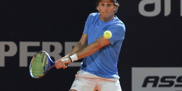 Uruguay's Forlan serves up dream as he launches tennis career