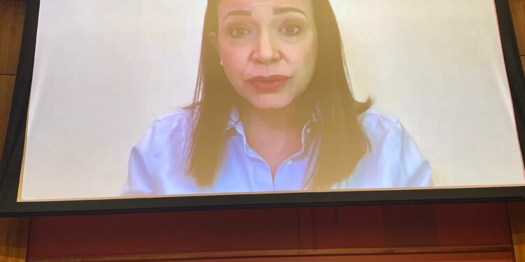 María Corina Machado appears virtually from Venezuela for a conversation with Larry Diamond at an FSI event.
