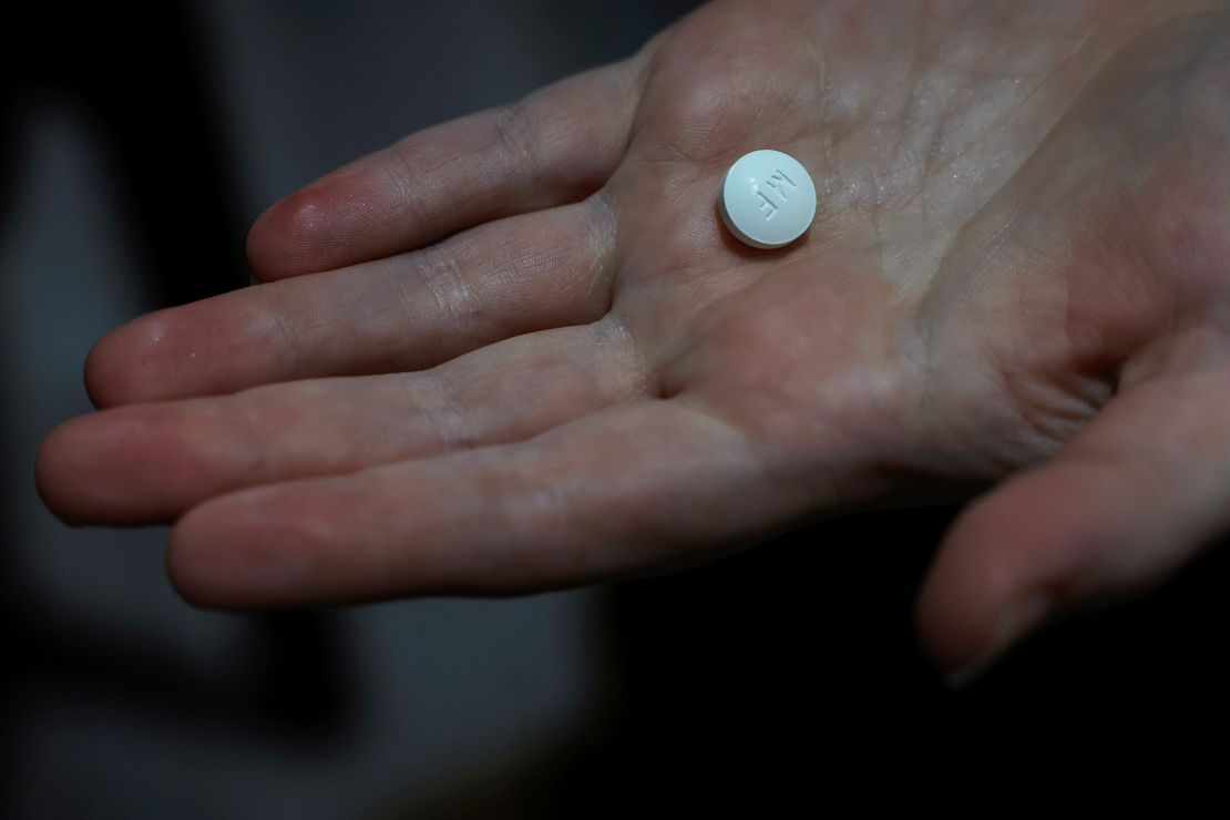 A patient prepares to take mifepristone, the first pill in a medical abortion, at Alamo Women's Clinic in Carbondale, Illinois, on April 9, 2024.