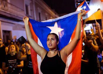 When was the Discovery of Puerto Rico and how is it traditionally celebrated?