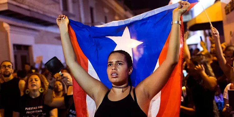 When was the Discovery of Puerto Rico and how is it traditionally celebrated?