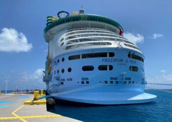Why are cruise ships registered in other countries?