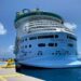 Why are cruise ships registered in other countries?