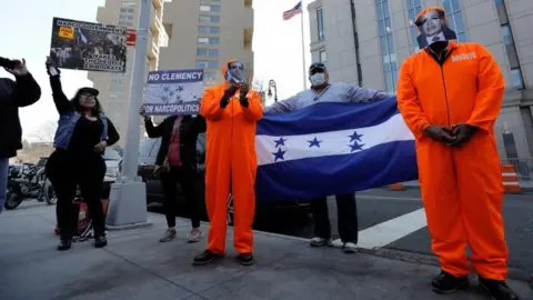 EPA Supporters of Justice for Honduras gather outside Federal Court in New York, USA, 30 March 2021. Former Honduran congressman Juan Antonio 