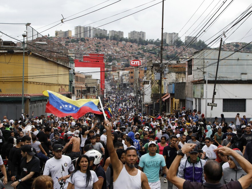 Protesters demonstrate in Caracas, Venezuela against the official election results declaring President Nicolás Maduro won reelection. 