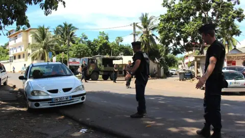 AFP Gendarmes control the road traffic and check IDs on 15 March 2018 in Majicavo in the French overseas territory of Mayotte