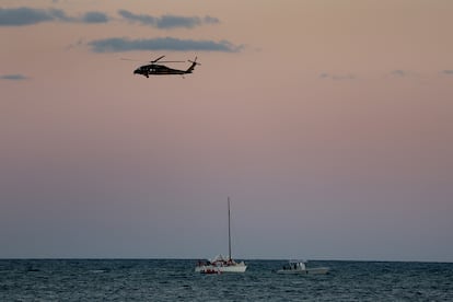 U.S. authorities assist dozens of Haitian migrants aboard a sailboat near Virginia Key in Miami, Florida. January 2023.