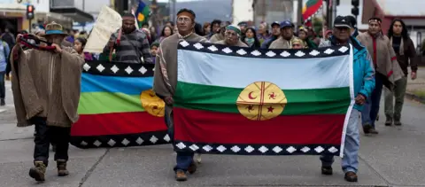 Getty Images Members of indigenous Mapuche communities march to protest against the implementation of Anti Terrorist Law in Valdivia, Chile, on April 15, 2016.