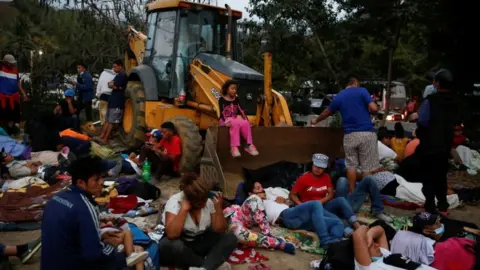 Reuters Hondurans taking part in a new caravan of migrants set to head to the United States, take a break in Vado Hondo, Guatemala