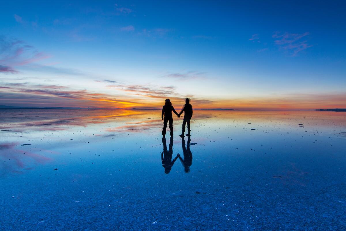 Here we can see how the sunrise over an infinite horizon with the Uyuni salt flats making a wonderful mirror.