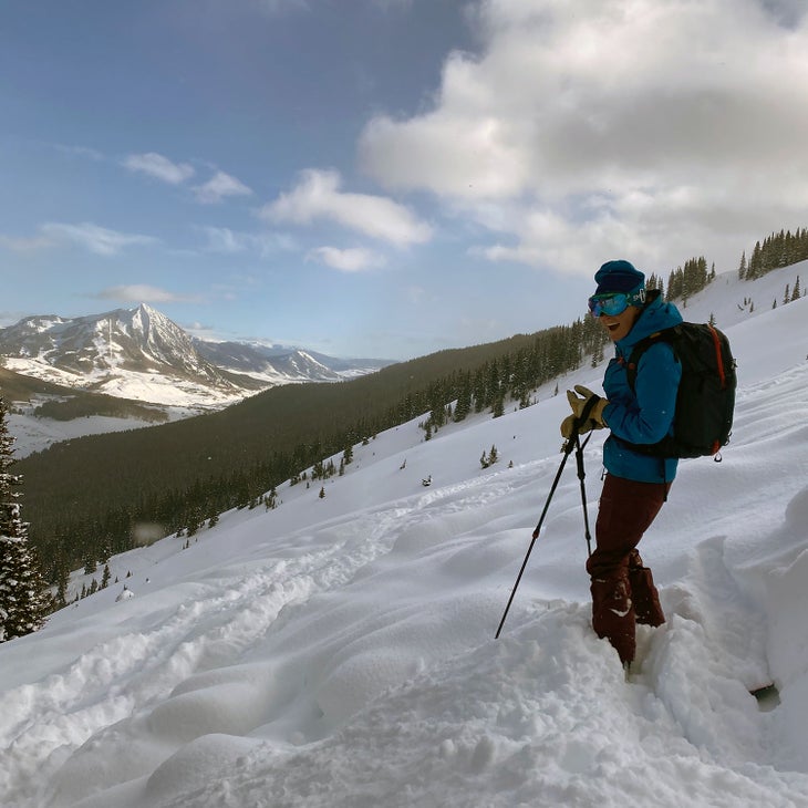 skier scoring pow on a cat skiing adventure with Irwin Guides in Crested Butte