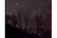 In this image taken from video, what appears to be drones flying over Randolph, N.J., Dec....