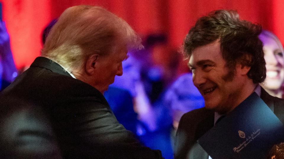 US President-elect Donald Trump shakes hands with Argentine President Javier Milei at the America First Policy Institute gala at Mar-A-Lago in Palm Beach, Florida, 14 November 2024