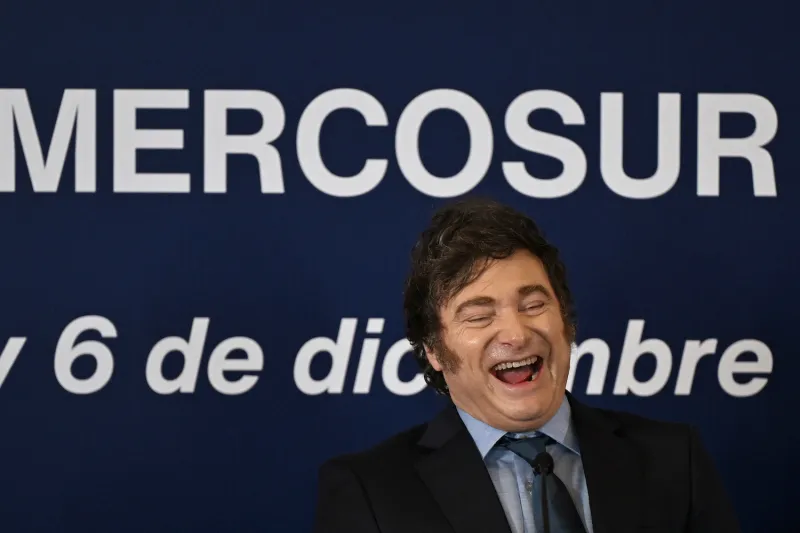 Argentine President Javier Milei laughs during a Mercosur Summit in Montevideo, Uruguay, on Dec. 6.