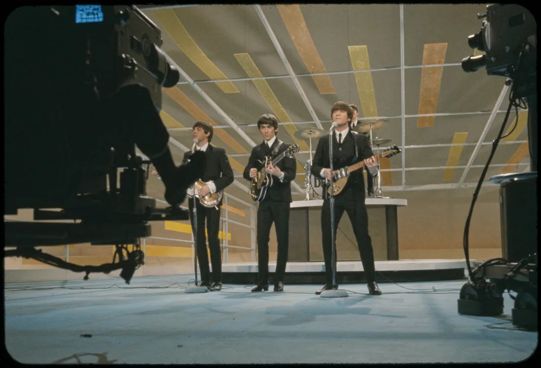 The Beatles performing on 