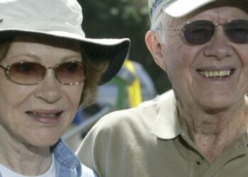 Why are flags flying at half-staff in California?