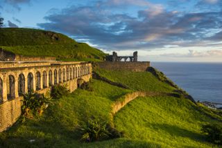 The stone Brimstone Hill Fortress with clouds in the background