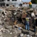 EPA Rescue workers search for missing persons among the rubble the day after an explosion occurred in San Cristobal, Dominican Republic, 15 August 2023.