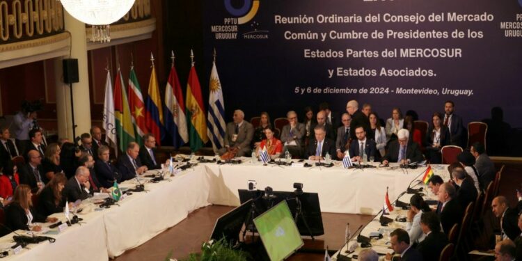Delegates attend the opening session of the LXV Mercosur Summit in Montevideo on December 5, 2024.