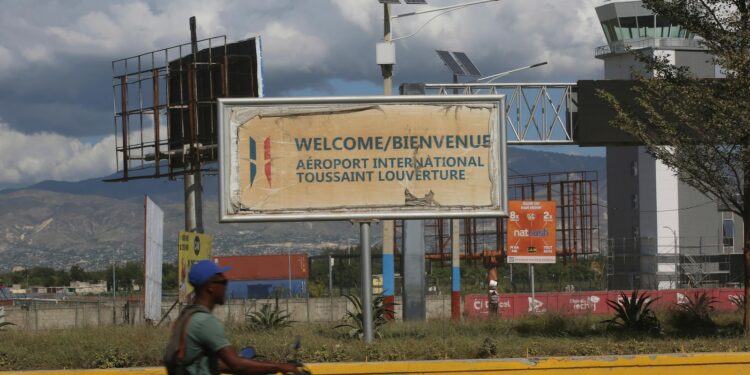 Haiti's main international airport reopens a month after gang gunfire forced it to close