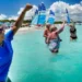 Getty Images Canadian tourists taking part in an exercise class in the sea off a beach in Varadero, Cuba